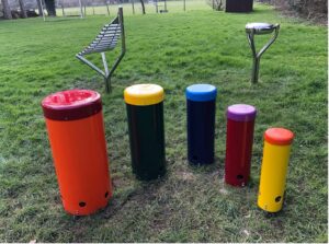 New colourful musical instruments including rainbow Samba drums, a shiny Babel drum, and a Xylophone.